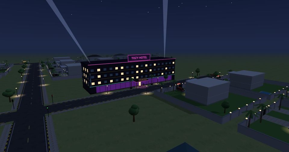 Tozy Hotel at night in Campus Sim